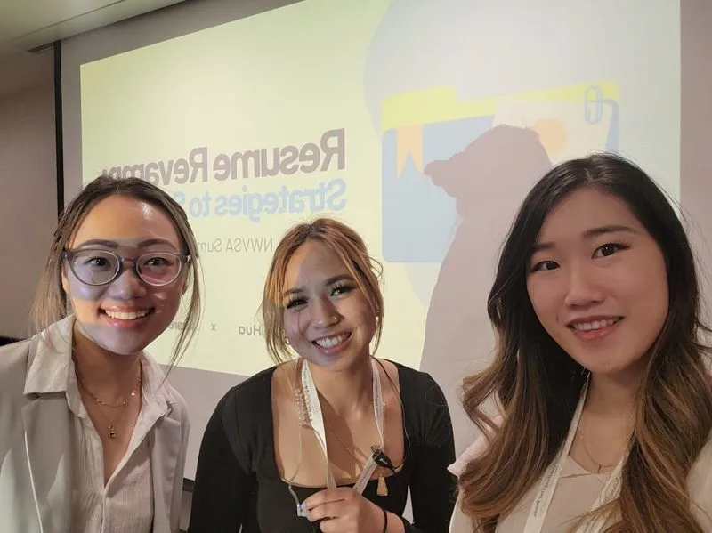 Selfie with two other workshop leads in front of a "Resume Revamp" slide at the NWVSA Summit